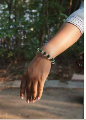 Green & White Bracelet worn on the wrist
