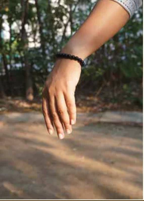 Black Bracelet worn on the wrist