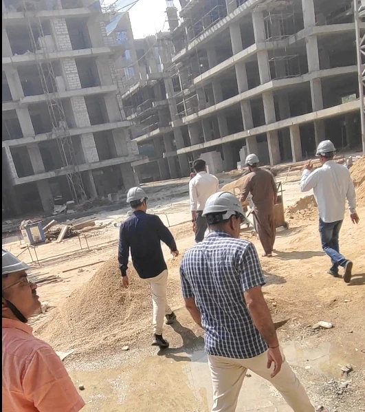 TEAM9 on a site visit to an apartment project under construction