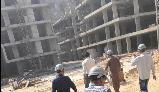 TEAM9 on a site visit to an apartment project under construction